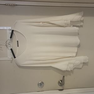 White top with bell sleeves